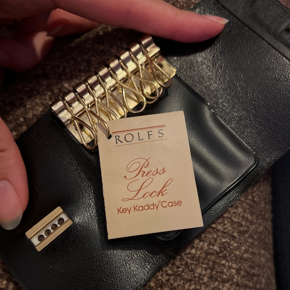 Black Rolf’s real cowhide press lock Key Kaddy Case.